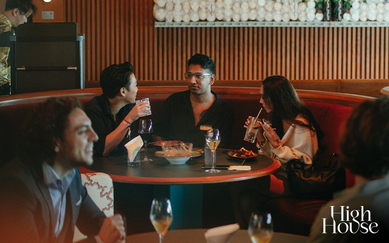 Friends enjoying lunch with a view at a luxurious restaurant