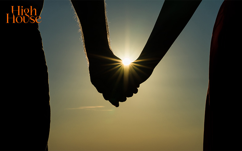 Romantic couple holding hands