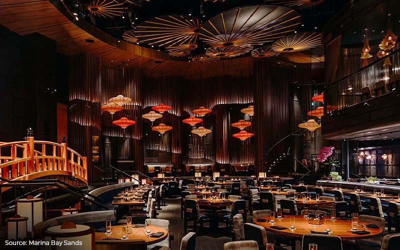 A sophisticated restaurant with intricate Japanese-inspired decor