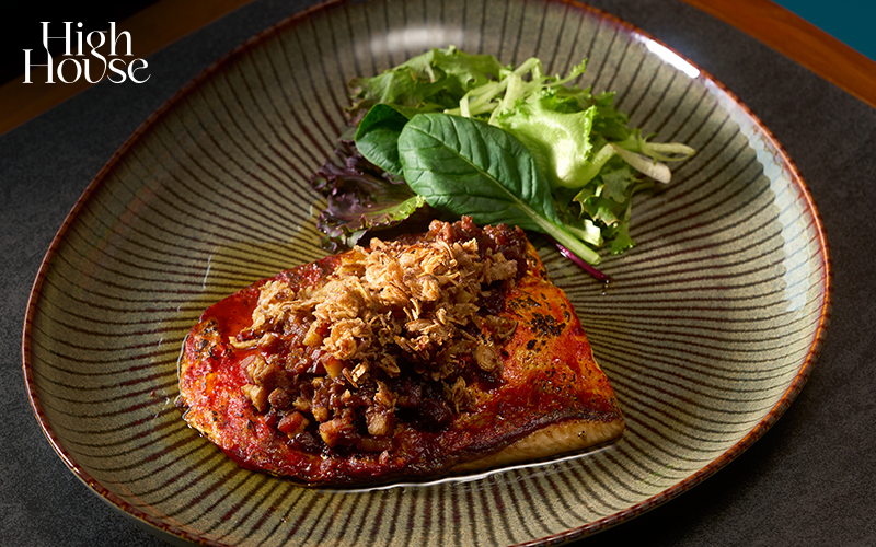 Close-up of a plated savory dish with salad
