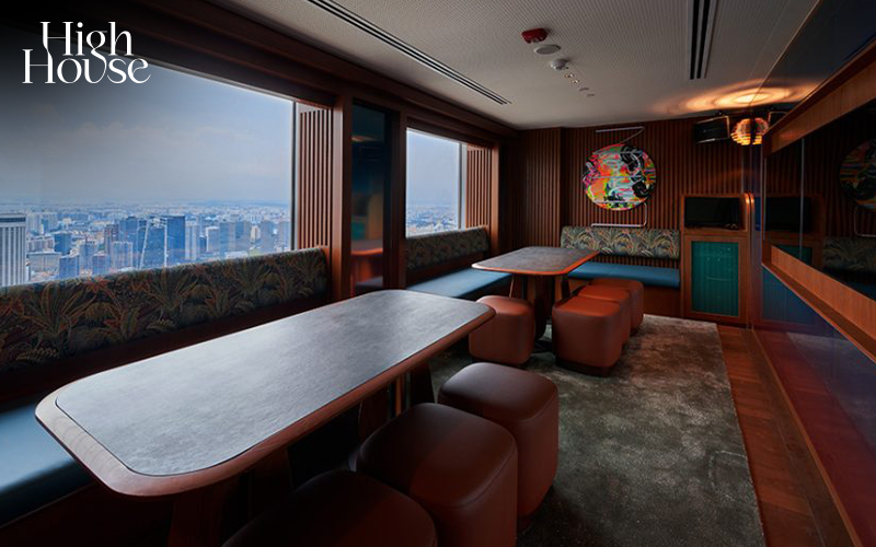Luxurious private dining karaoke room with a city view